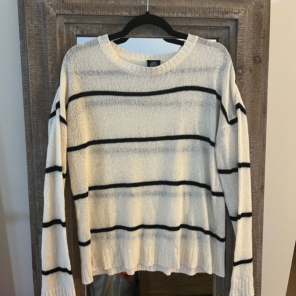 Black and white striped knit sweater.